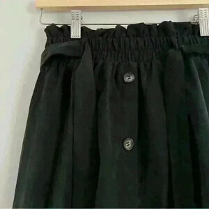 NWOT black suede skirt with buttons